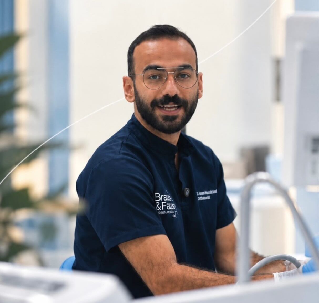 Dr. Kareem Moustafa Kamel at the dental chair